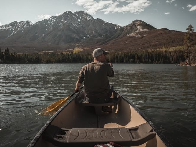 man on a bug out boat