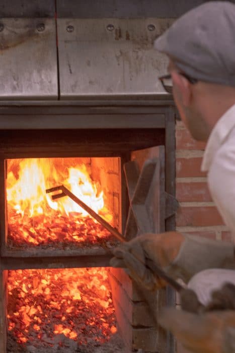 man in fireplace