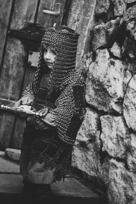 child wearing chain mail