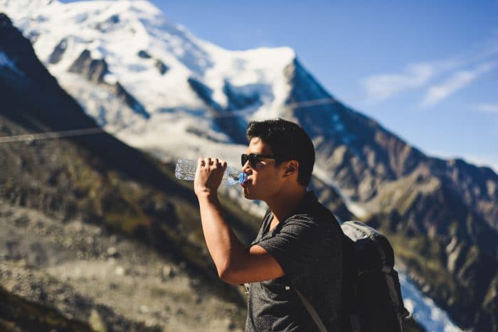 man drinking water